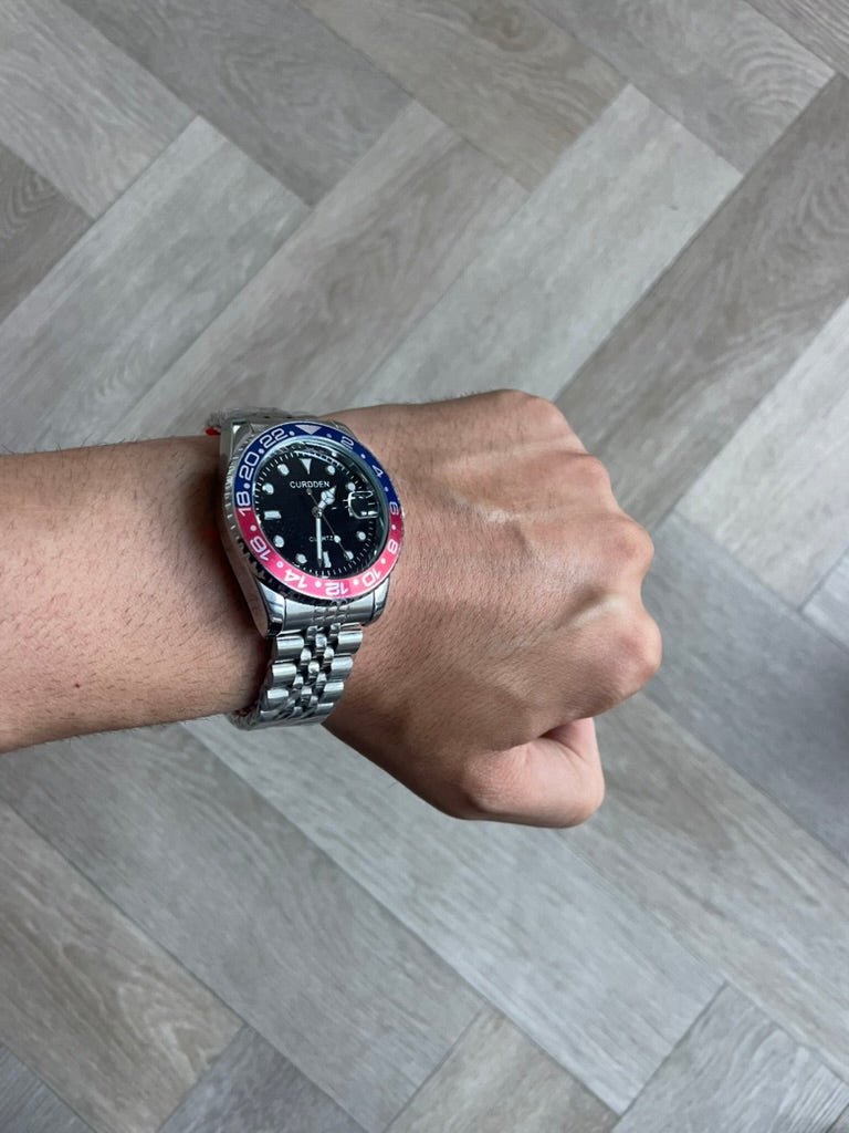 Men's Silver Watch – Black Dial, Blue & Red Bezel, Jubilee Strap