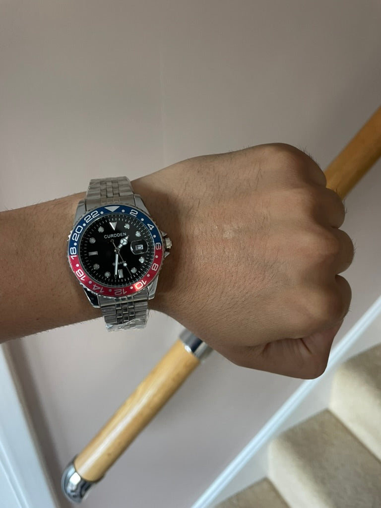 Men's Silver Watch – Black Dial, Blue & Red Bezel, Jubilee Strap
