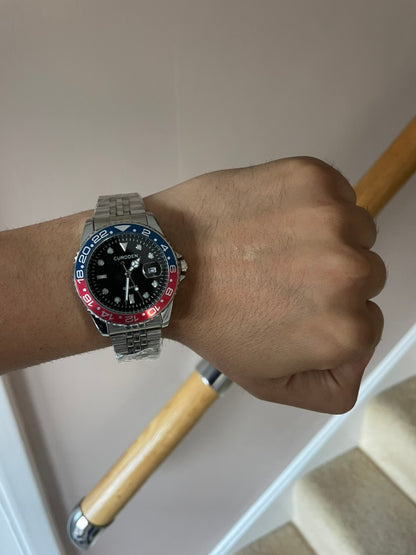 Men's Silver Watch – Black Dial, Blue & Red Bezel, Jubilee Strap